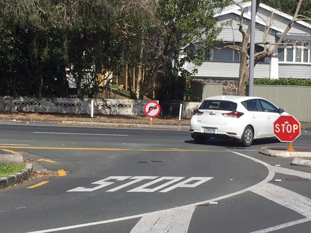 TGhe wrong sign bans right-turn traffic at Asquith Ave Traffic i n Asquith Ave, Mt Albert